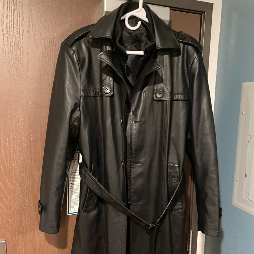 I have a black xl teach coat. Brand is Runchuanyidu. Faux fur inside.